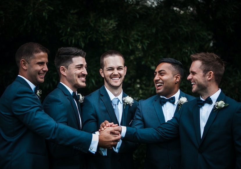 Download Groomsmen Posing for a Group Picture on the Big Day |  Wallpapers.com
