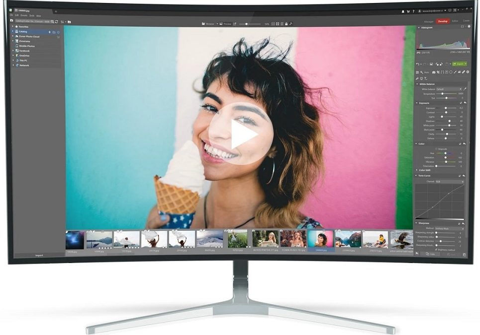 Curved computer monitor displaying a photo editing software interface with an image of a smiling woman holding an ice cream cone.
